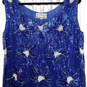 Top vintage in seta con paillettes
Taglia M